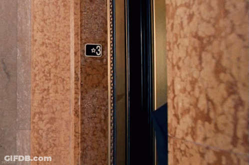 An Elevator With The Number 3 On The Wall GIF