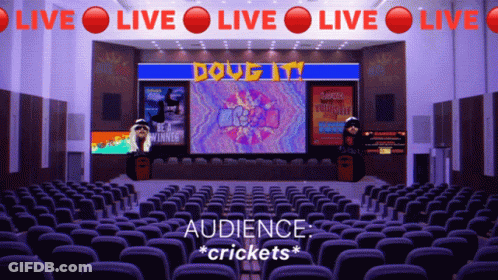An Empty Auditorium With A Sign That Says Live Live Live GIF