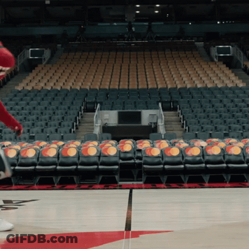 An Empty Basketball Stadium With Rows Of Seats That Say Mastercard On Them GIF