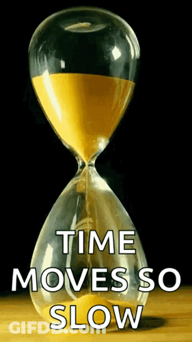 An Hourglass With The Words " Time Moves So Slow " On It GIF