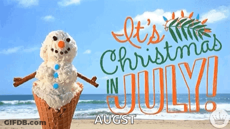 An Ice Cream Cone Shaped Like A Snowman On The Beach With The Words " It 'S Christmas In July " GIF
