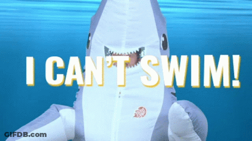 An Inflatable Shark Says " I Can 'T Swim " GIF