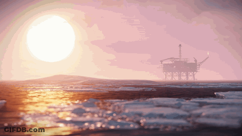 An Oil Rig In The Middle Of The Ocean With The Sun In The Background GIF