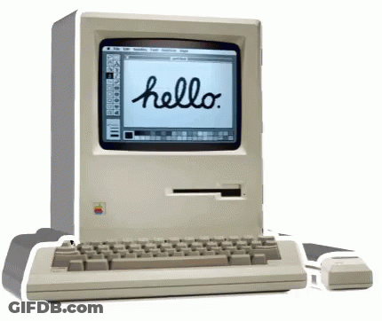 An Old Apple Computer With The Words Hello On The Screen GIF