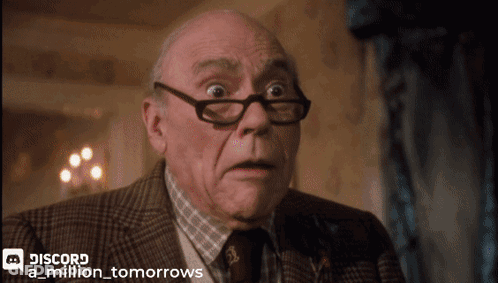 An Old Man Wearing Glasses And A Suit Has Discord A Million Tomorrows Written On The Bottom Right GIF