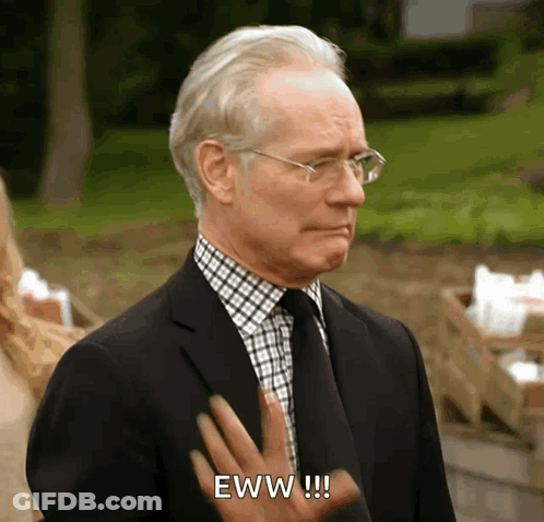 An Older Man In A Suit And Tie Says Eww GIF