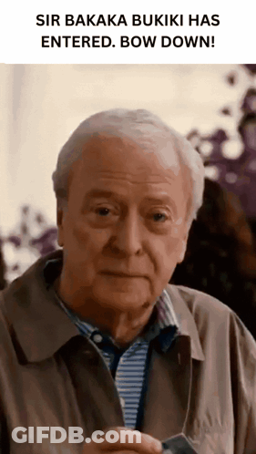 Older Man Holding Sir Bakaka Buiki Paper GIF