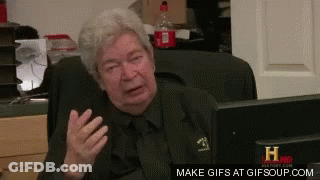 An Older Man Is Sitting In Front Of A Computer Screen That Says Make GIFs At Gifsoup.com On The Bottom GIF