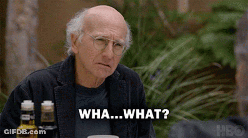 An Older Man Sitting At A Table With A Bottle Of Hbo On The Table GIF