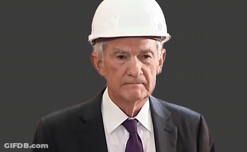 An Older Man Wearing A Hard Hat And A Suit GIF
