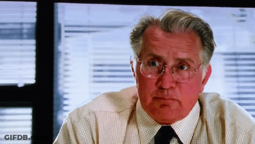 An Older Man Wearing Glasses And A White Shirt And Tie GIF