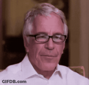 An Older Man Wearing Glasses And A White Shirt Is Smiling GIF