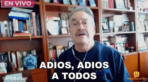 An Older Man Wearing Headphones Says " Adios Adios A Todos " GIF