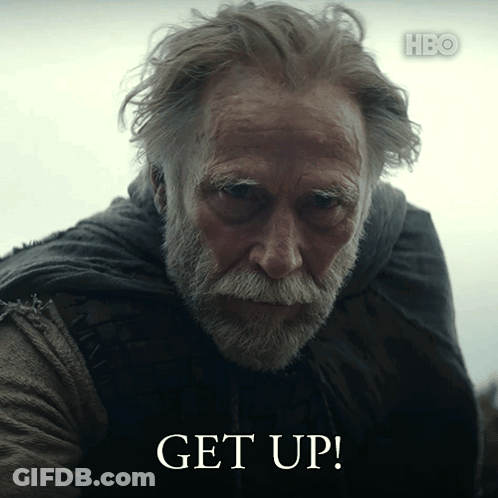 An Older Man With A Beard And A Scarf Says Get Up GIF