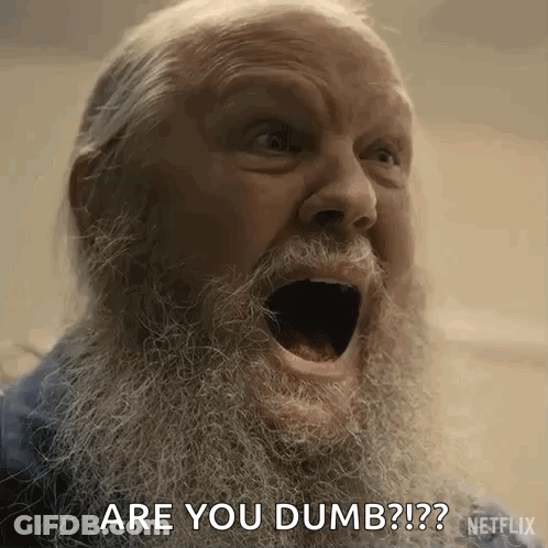 An Older Man With A Beard Is Screaming With His Mouth Open And Asking Are You Dumb ? GIF