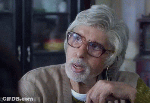 An Older Man With Glasses And A Beard Has The Hashtag @Baateinhawaain On The Bottom Right GIF