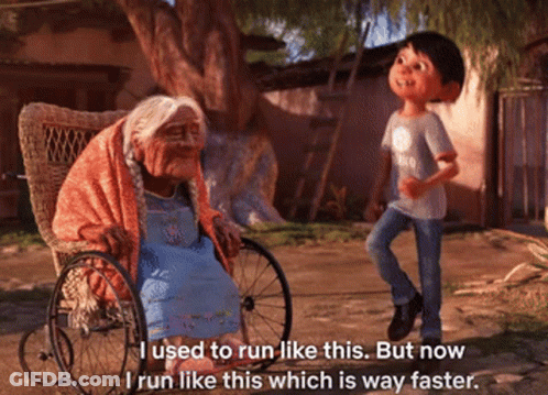 An Older Woman In A Wheelchair Is Talking To A Young Boy Who Is Running GIF