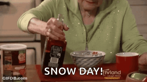 An Older Woman Is Sitting At A Table With A Bowl Of Cereal And A Bottle Of Sauce . GIF