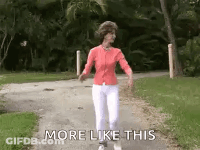 An Older Woman Is Walking Down A Path With The Words `` More Like This '' . GIF