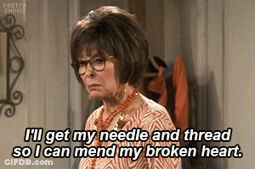 An Older Woman Wearing Glasses And A Necklace Is Saying I 'Ll Get My Needle And Thread GIF