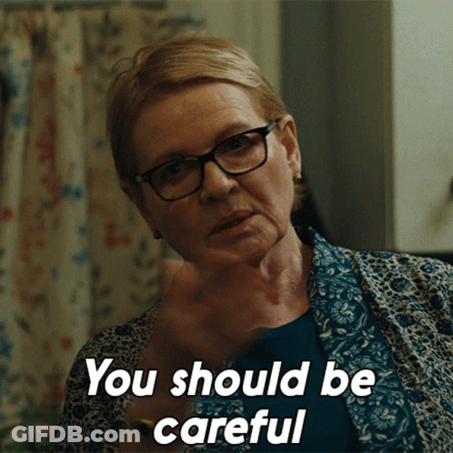 An Older Woman Wearing Glasses Says " You Should Be Careful " GIF