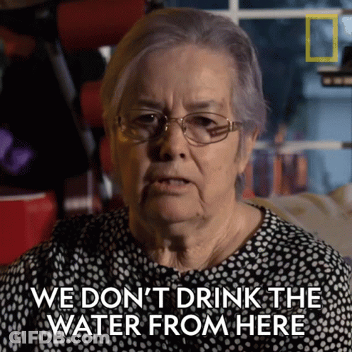 An Older Woman With Glasses Says We Don 'T Drink The Water From Here GIF