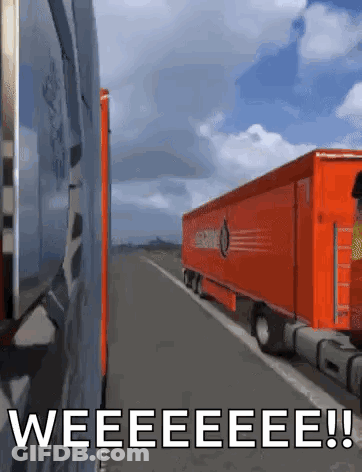 An Orange Semi Truck Is Driving Down A Highway With The Words " Weeeeeeeee " Written On The Bottom GIF