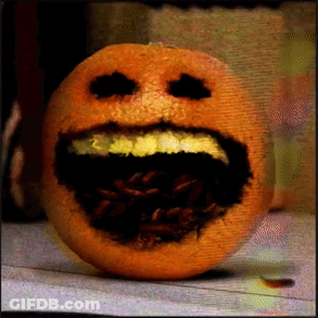 An Orange With A Smiley Face On It GIF