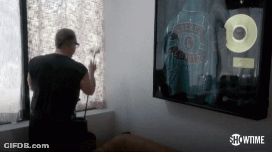 Andrew Dice Clay Breaks Glass With Golf Club GIF