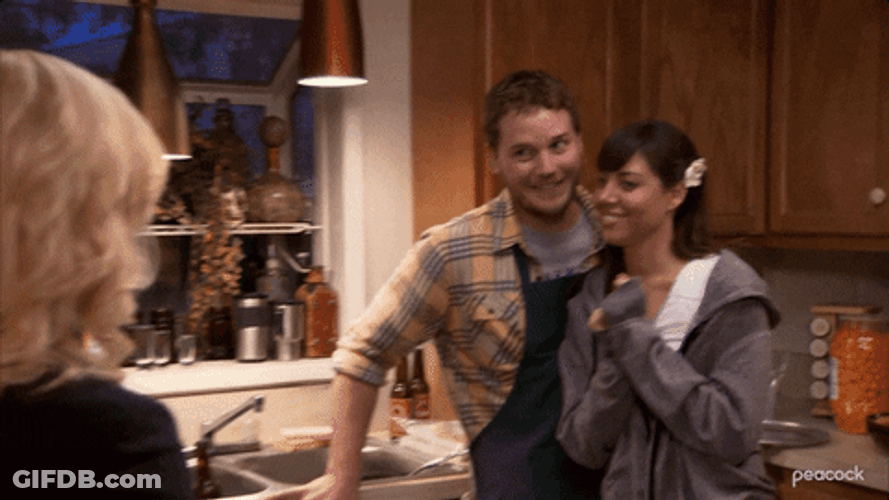 Andy Dwyer Grinning Alongside Aubrey Plaza GIF