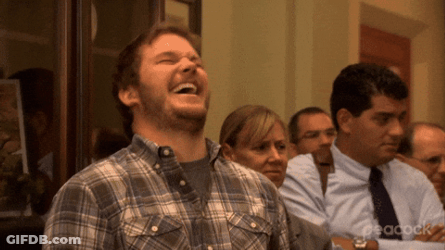 Andy Dwyer Laughing With People Around GIF