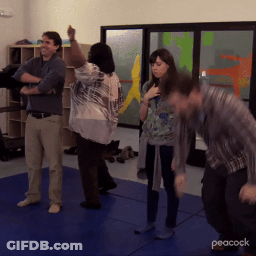 Andy Dwyer Rolling On A Floor Mat GIF