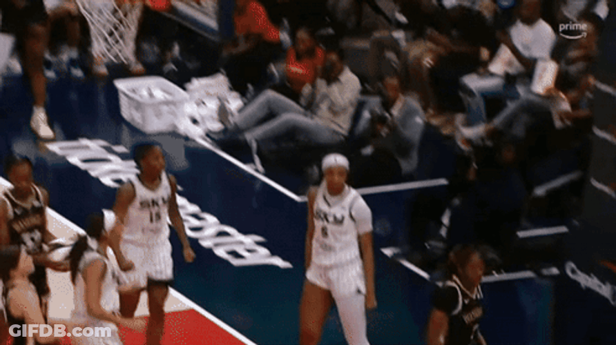 Angel Reese Chest Bump GIF