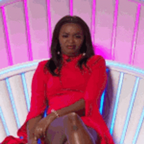 Angela Big Brother Shrug GIF