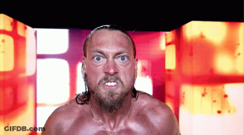 Angry Bearded Man In Front Of Screen GIF