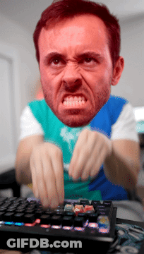 Angry Bearded Man Typing GIF