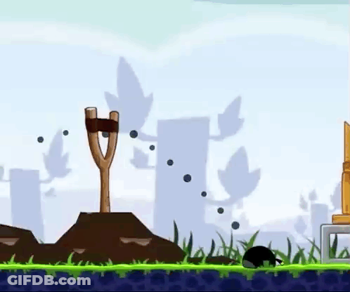 Angry Birds Game With Slingshot In Field GIF