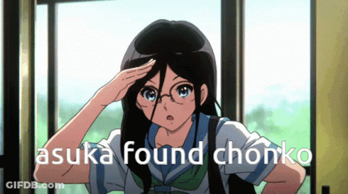 Angry Girl Sitting At Table GIF