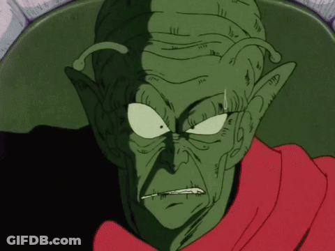 Angry Green Cartoon Character With Red Scarf GIF