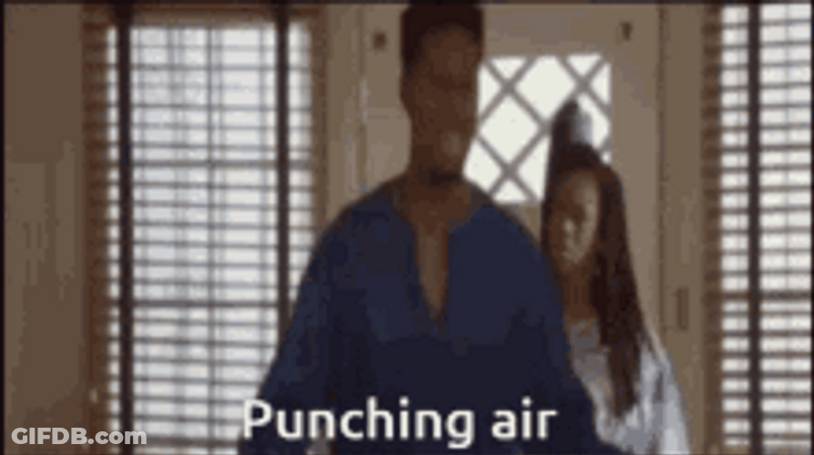 Angry Guy Punching Air GIF