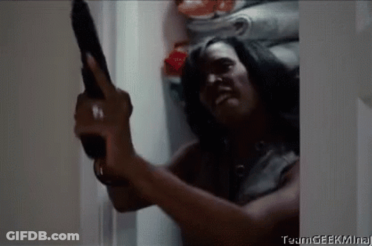 Angry Lady Loading Gun GIF