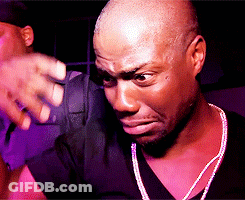 Angry Man In Black Shirt And Necklace GIF