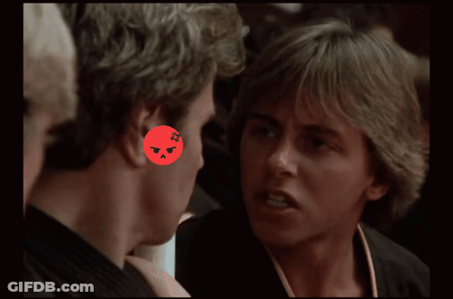 Angry Man With Red Circle Around Ear GIF