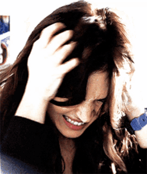 Angry Megan Fox Scratching Head GIF