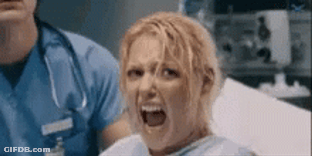Angry Woman Giving Birth GIF