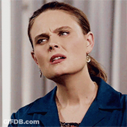 Angry Woman In Blue Jacket And Earrings GIF