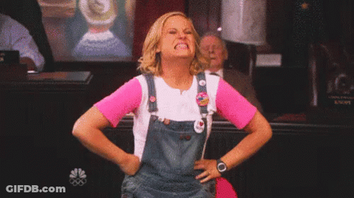 Angry Woman In Overalls And Pink Shirt GIF