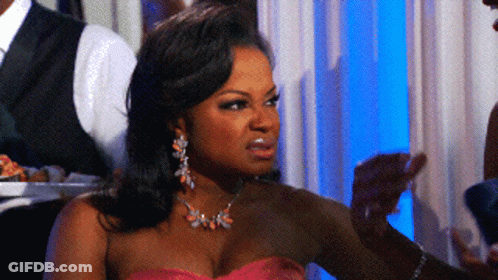 Angry Woman In Pink Dress With Earrings GIF