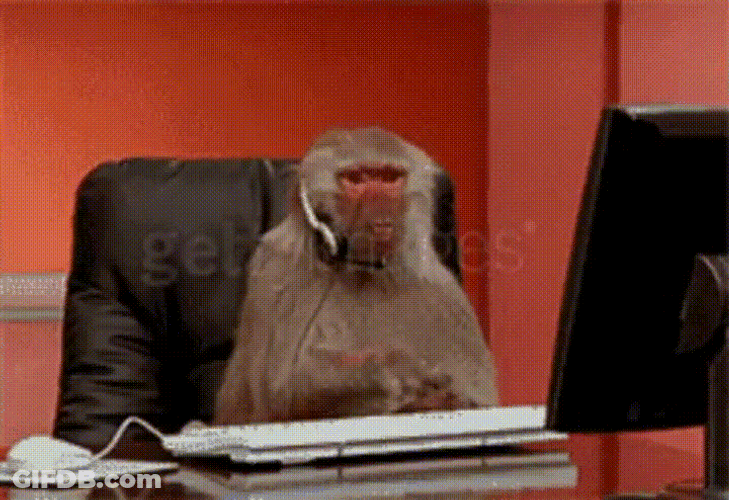 Angry Working Monkey Typing GIF