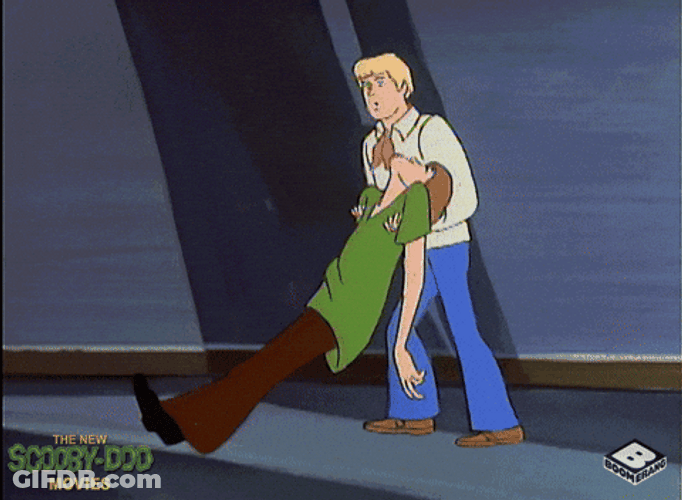 Animated Fred Pushing Passed Out Shaggy GIF